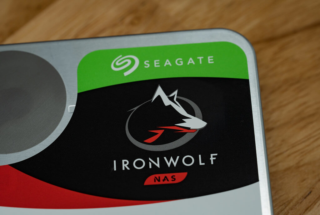 Close up of the Seagate and IronWolf logos on the top corner of the HDD
