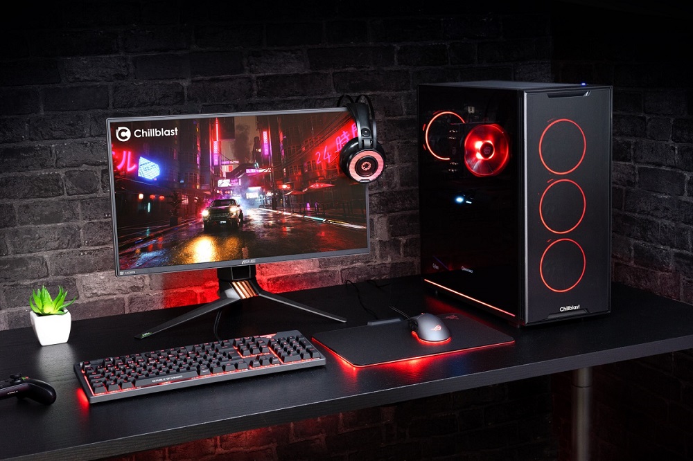 Image of a full gaming PC setup with red RGB and LED lighting 